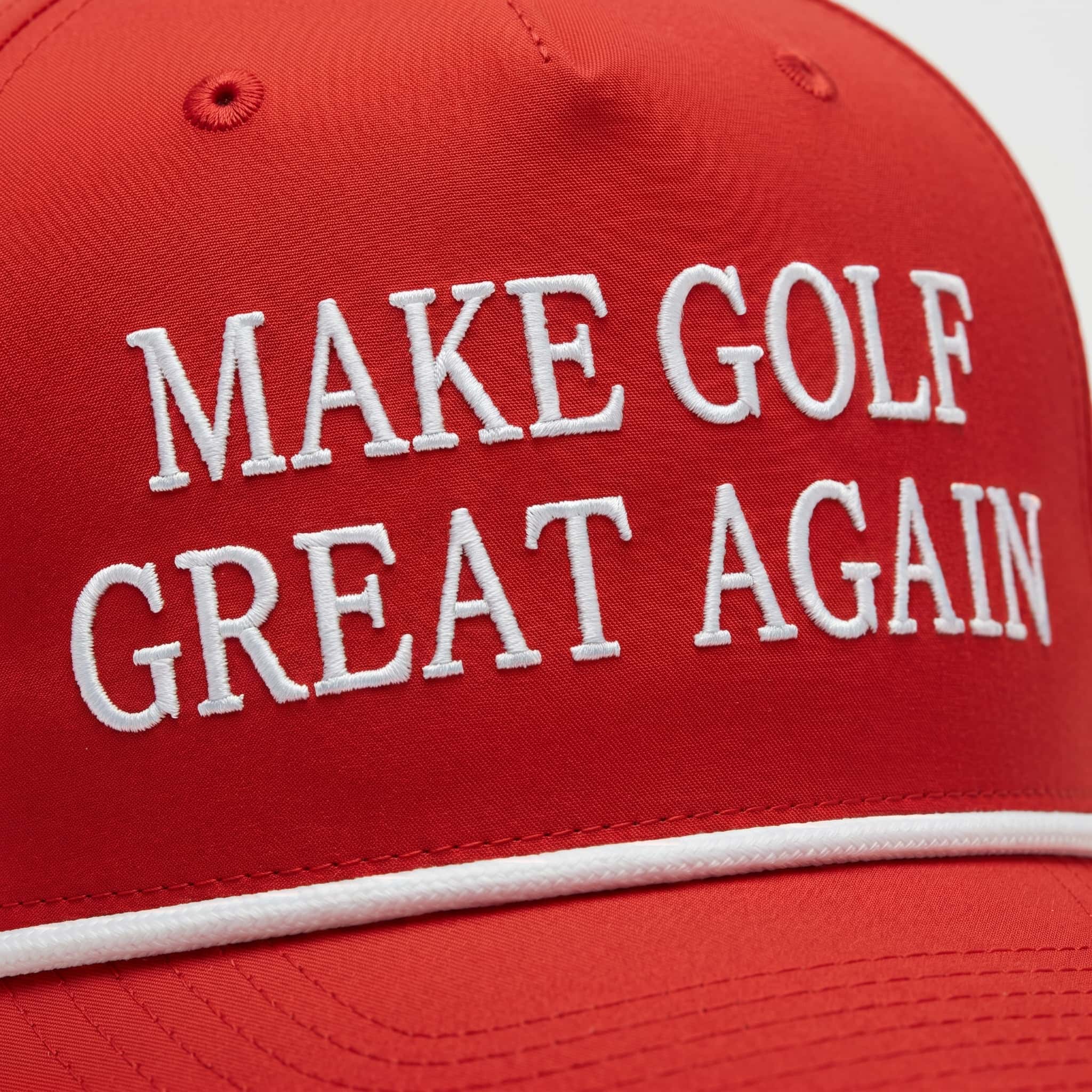 Raised embroidery detail on red golf hat