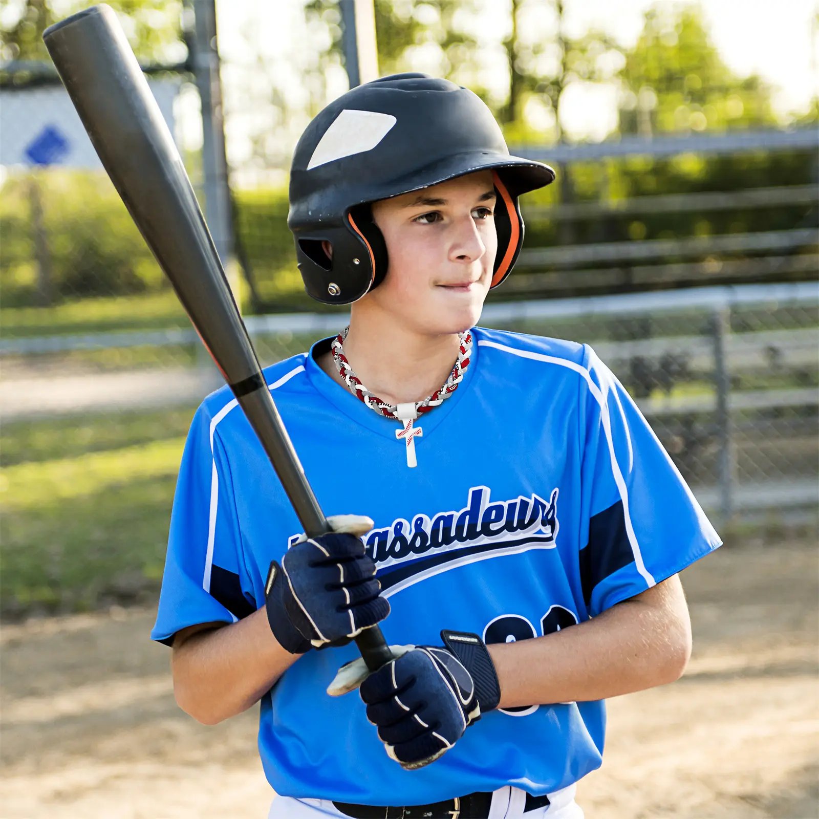 Boy wearing the baseball necklace