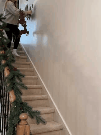 Christmas Reindeer and Santa Sleigh Wall Light hero animation