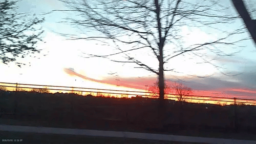 Sample footage captured with the mini keychain camera showing a warm sunset scene