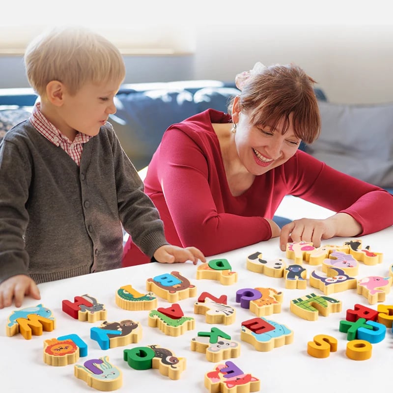Large graspable wooden alphabet pieces